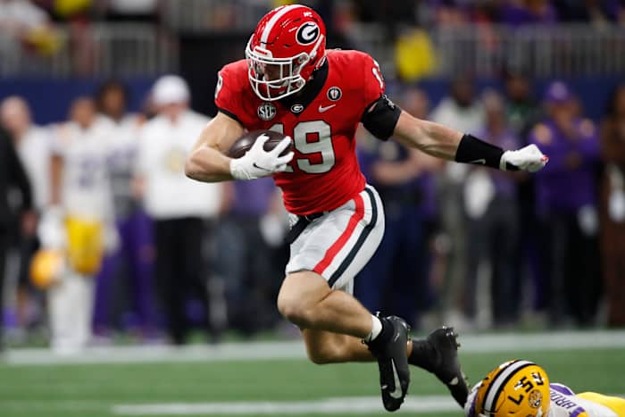 Brock Bowers (19) moves the ball during the first half of the SEC Championship NCAA college football game between LSU and Georgia in Atlanta, on Saturday, Dec. 3, 2022. News Joshua L Jones